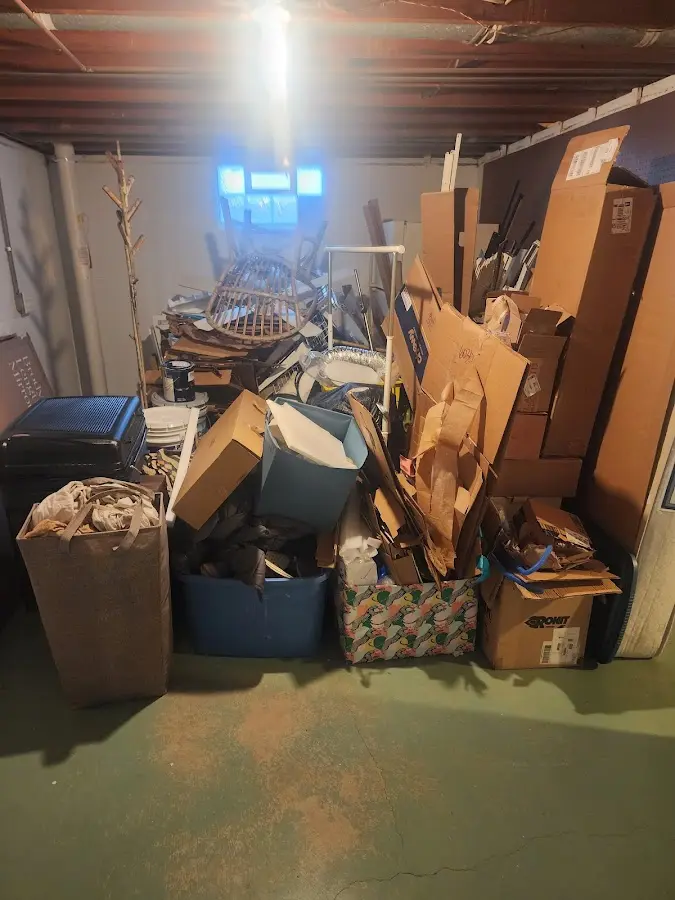 Roll-off dumpster container at job site for 6 Yard Dumpster Rental in Forest Glen